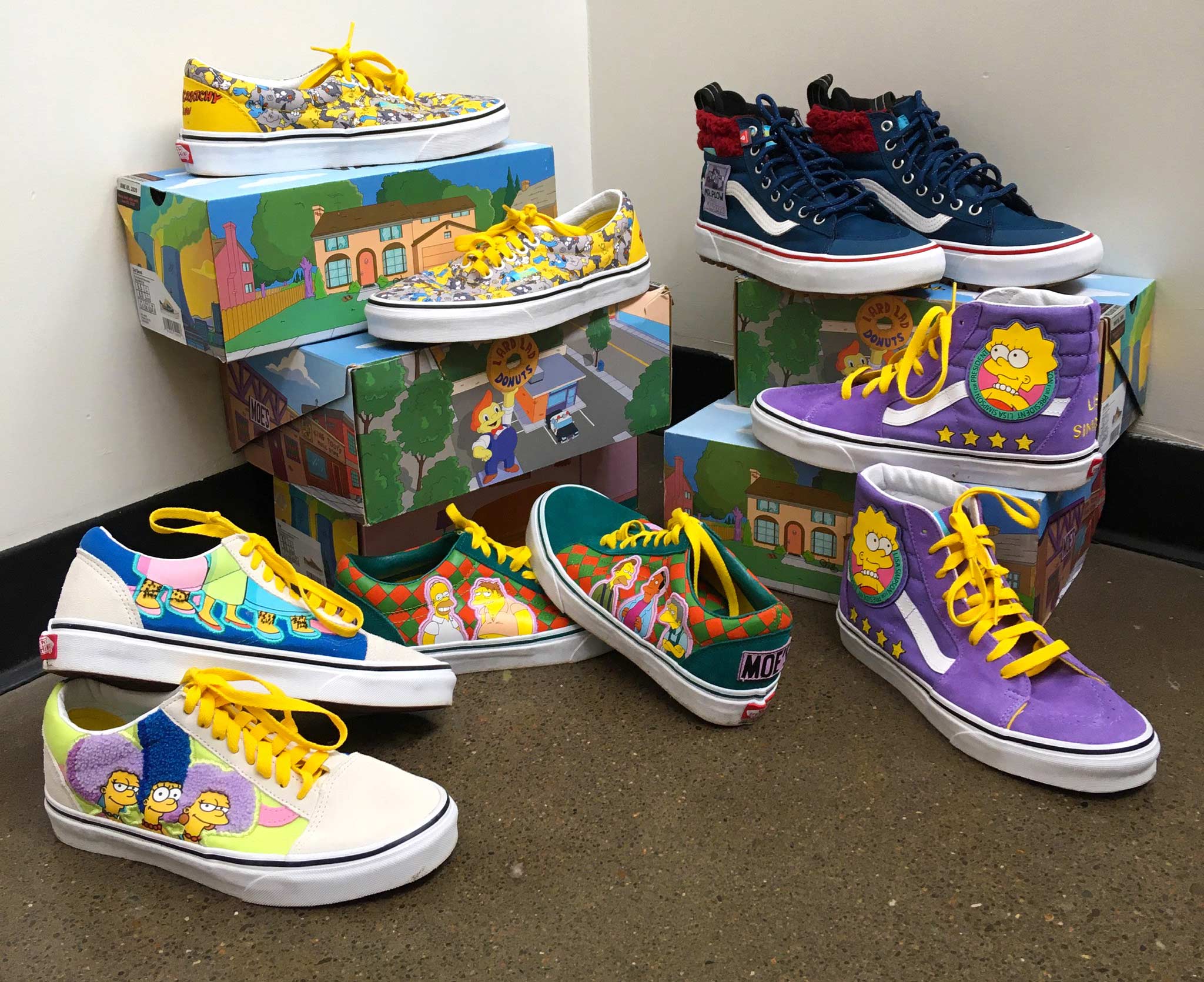 a collection of Simpsons Vans shoes and their boxes at Buffalo Exchange Eugene