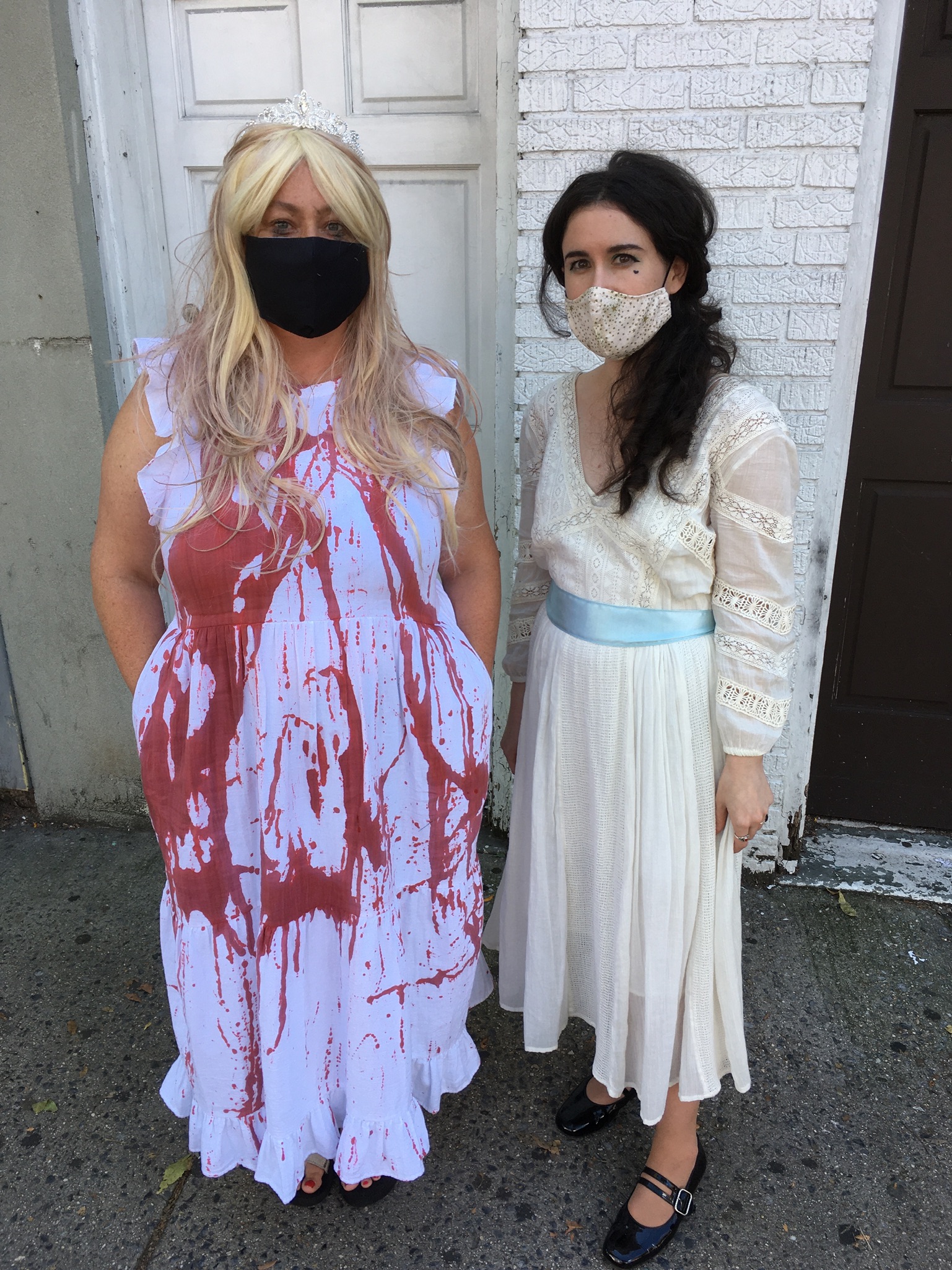 2 Women wearing a Carrie Costume and Baby Jane Costume
