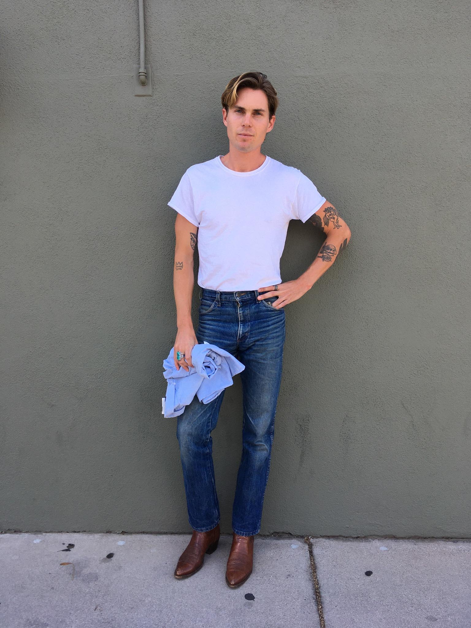 Classic jeans paired with plain white t-shirt and brown chelsea boots