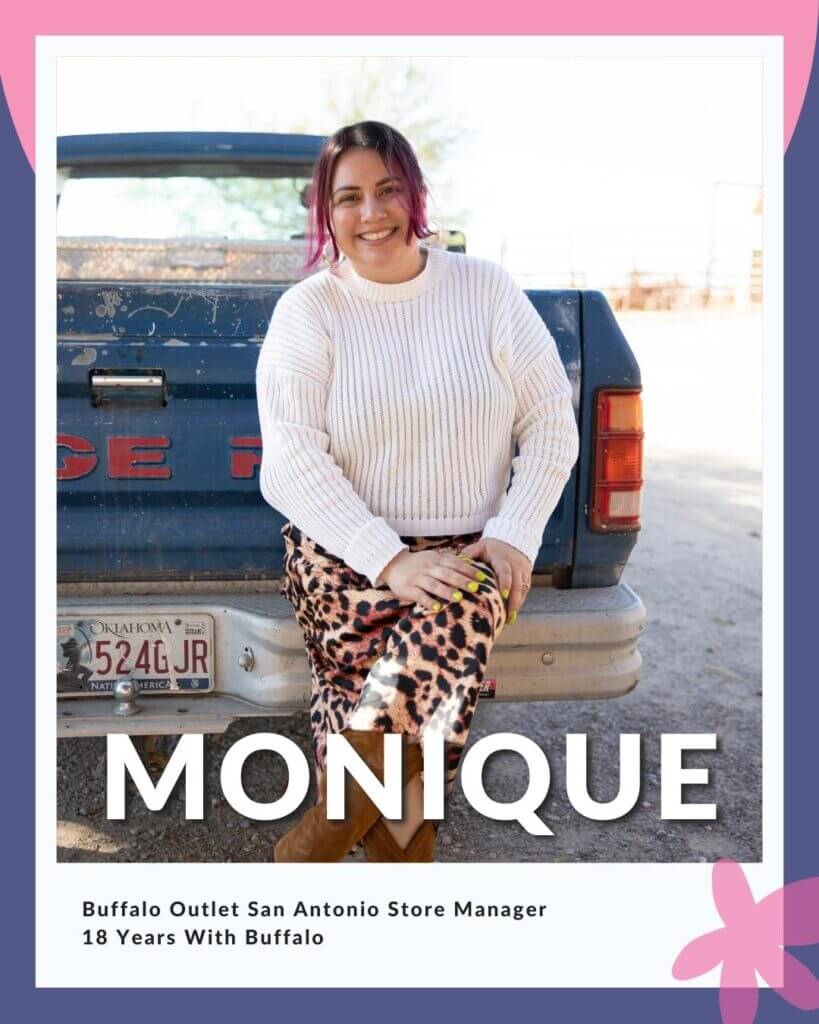 Monique sitting on blue truck; reads Buffalo Outlet San Antonio Store Manager, 18 Years With Buffalo Exchange