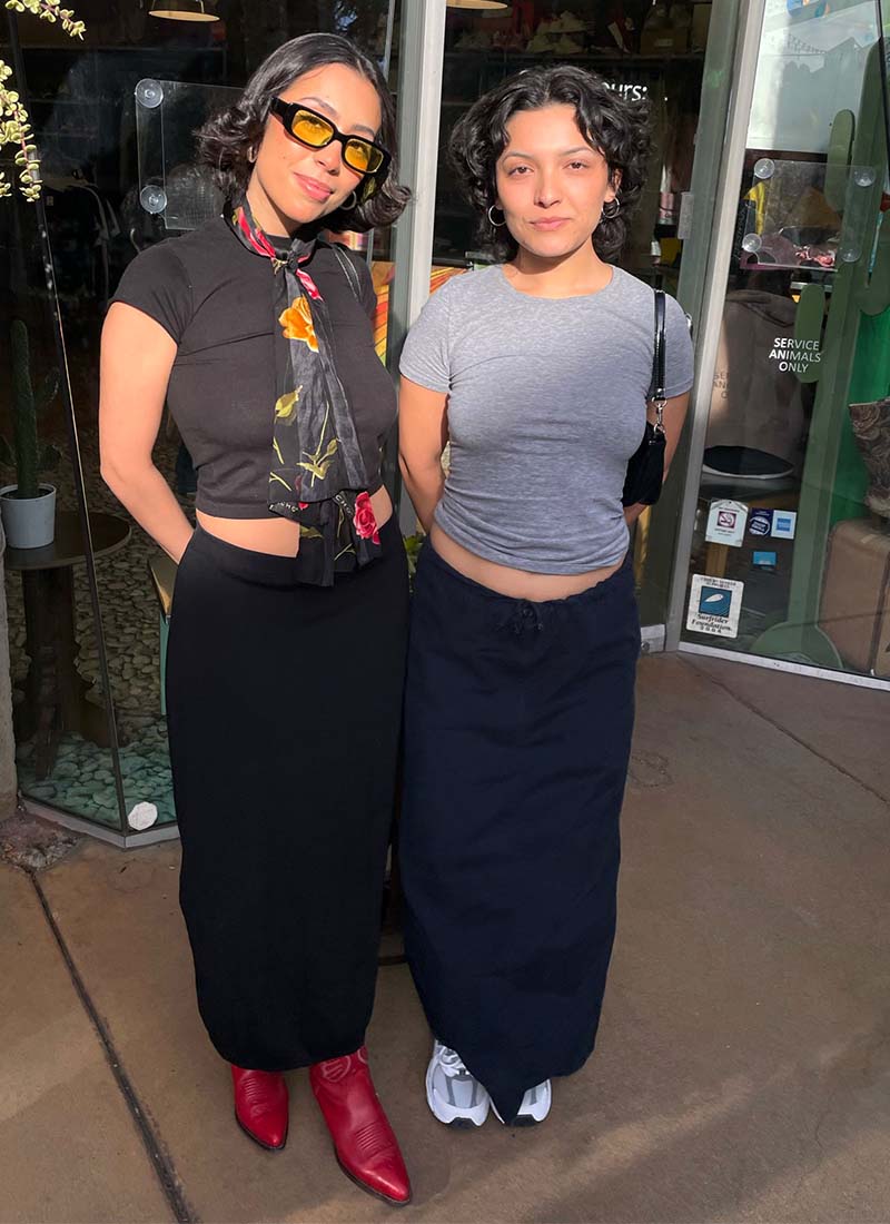 2 People Wearing Column Skirts & Crop Tees in Front of Buffalo Exchange Store
