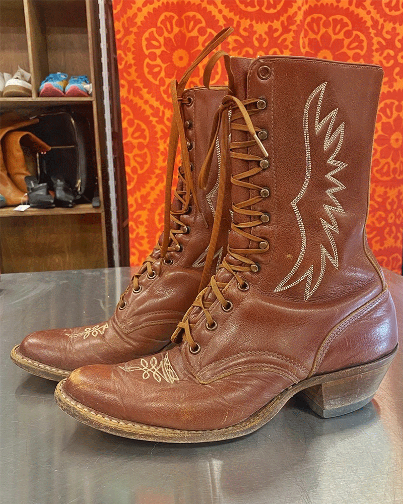 brown western boots on counter