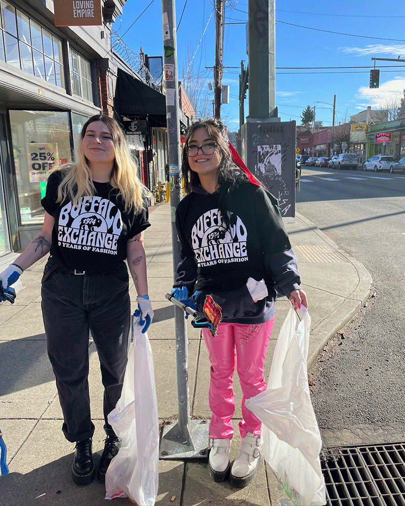 Buffalo Exchange employees posing for photo while picking up trash on Neighborhood Clean Up