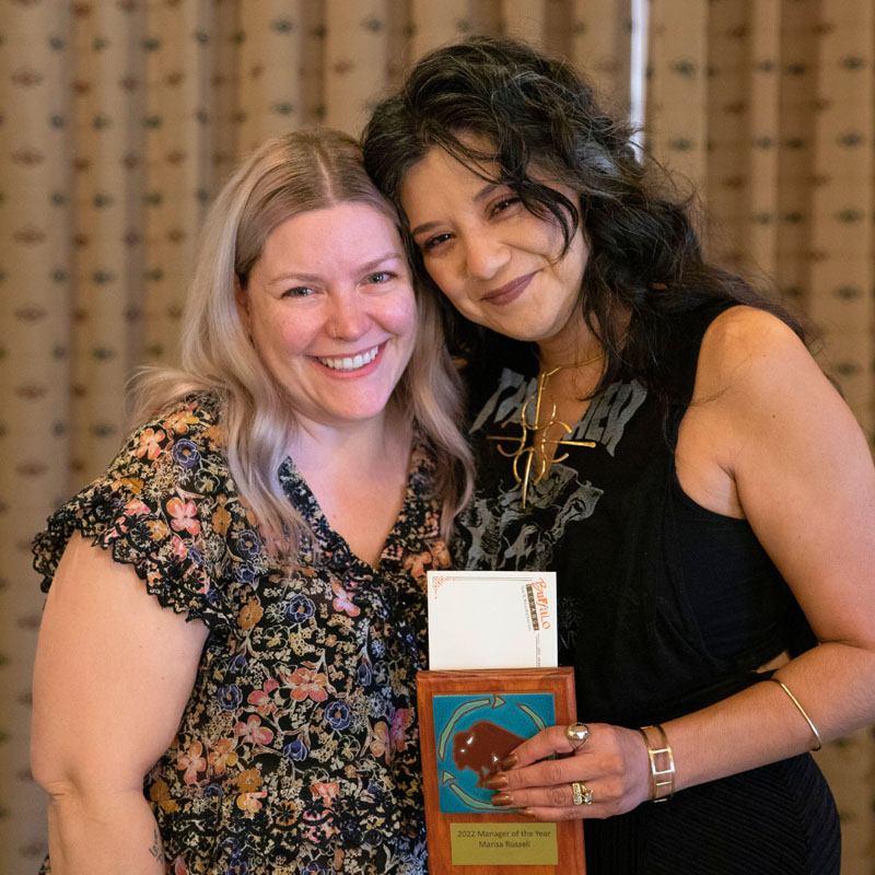 Marisa with her area manager, Kat, and her 2022 Manager of the Year Award