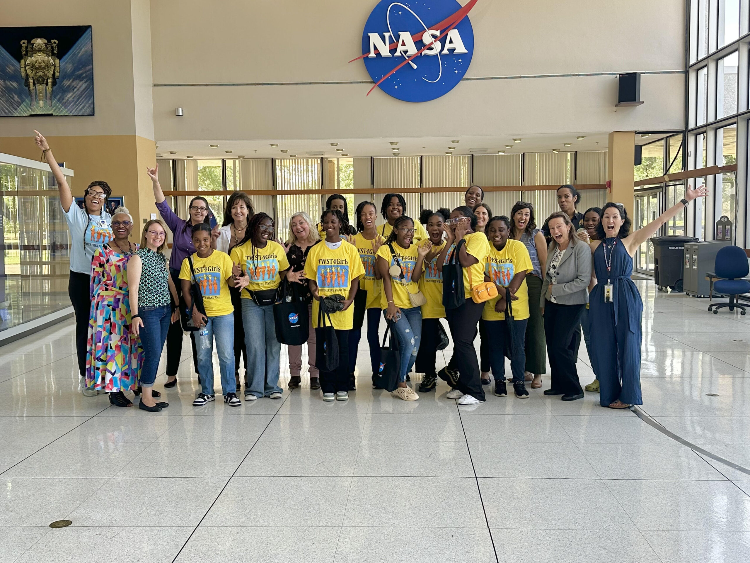Group from Together we stand tall for girls visiting Nasa