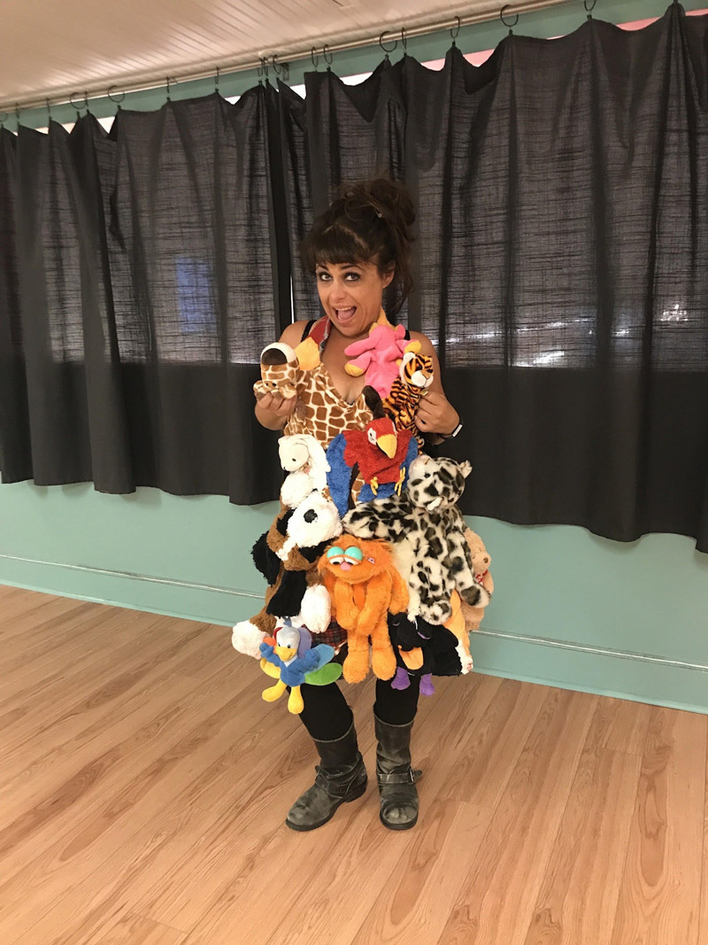 Denise wearing dress made of toy animals