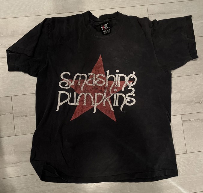 Black Smashing Pumpkins t-shirt with red star and white text