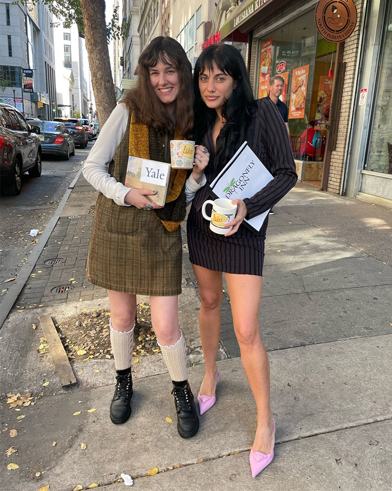 Two women dressed as Lorelai and Rory Gilmore from Gilmore Girls