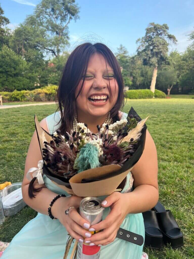 Yesenia holding flowers