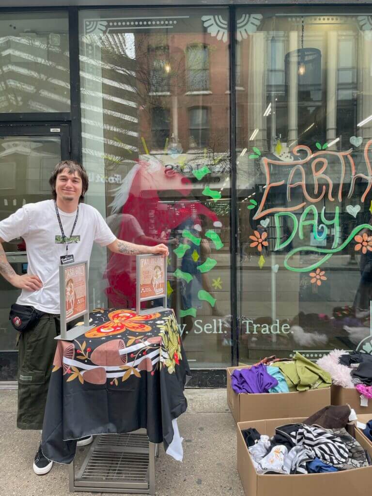 employee outside of store celebrating earth day