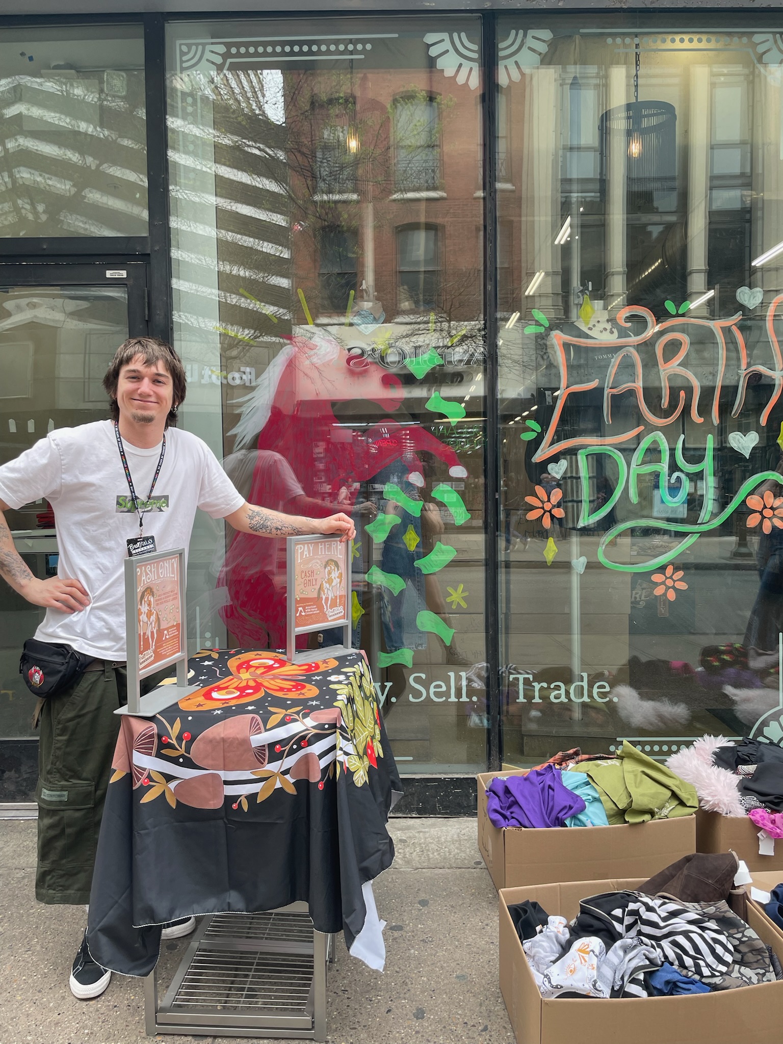 2025.04.19 PA1 Earth Day $1 Sale (2) Customer paying for their dollar finds