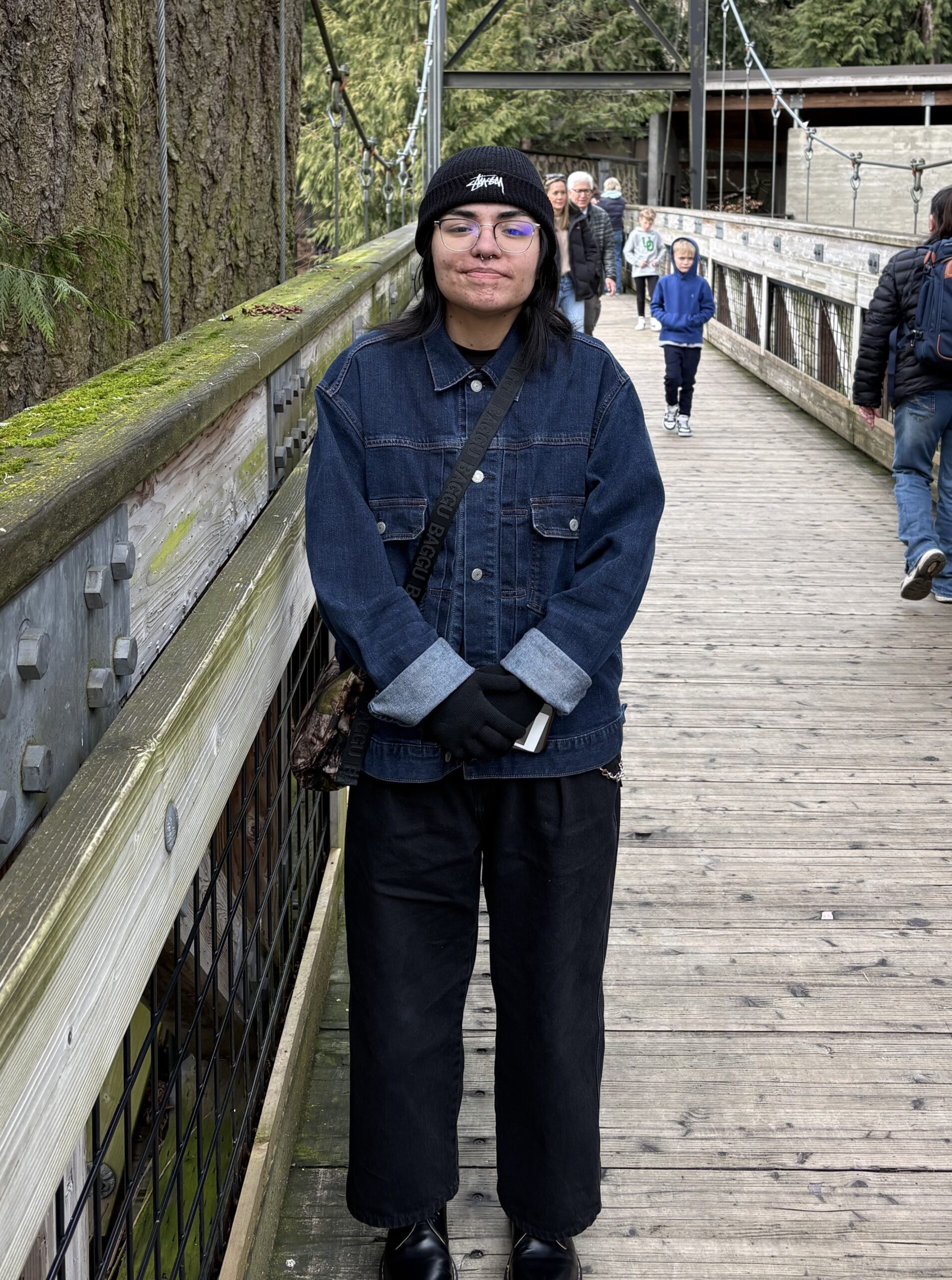 IMG_1409-crop Employee Krystal standing on bridge in nature