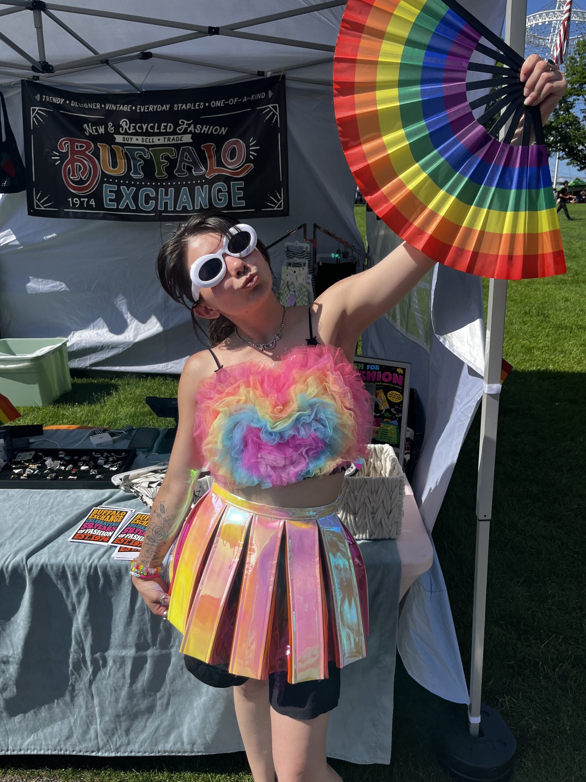 IMG_8343 Employee Gwen in rainbow outfit with rainbow fan