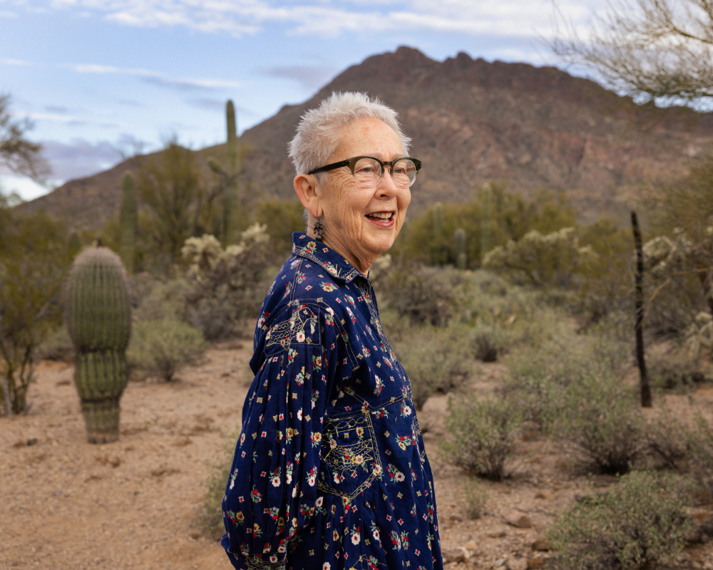 2022 Kerstin Block by Agaton Strom portrait of Buffalo Exchange founder Kerstin Block standing in desert mountain landscape