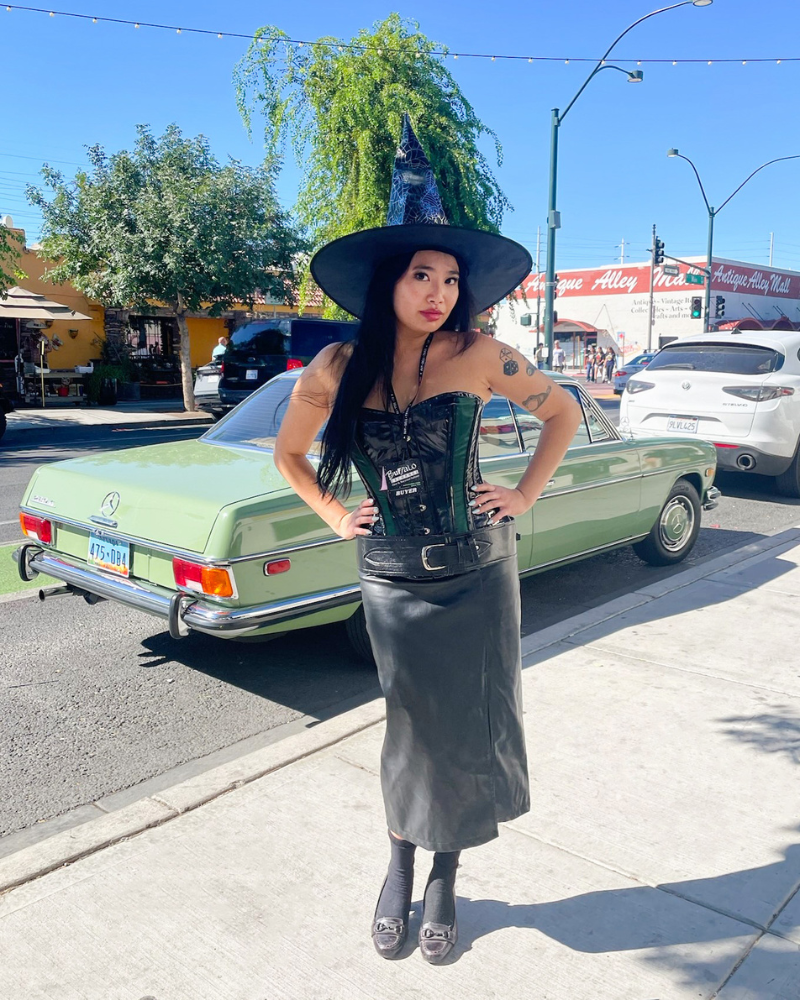 8 Buffalo Employee in witch hat with leather corset and skirt