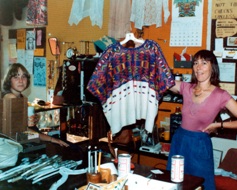 Untitled design (2) Vintage photo of Kerstin Block holding up a colorful piece of clothing
