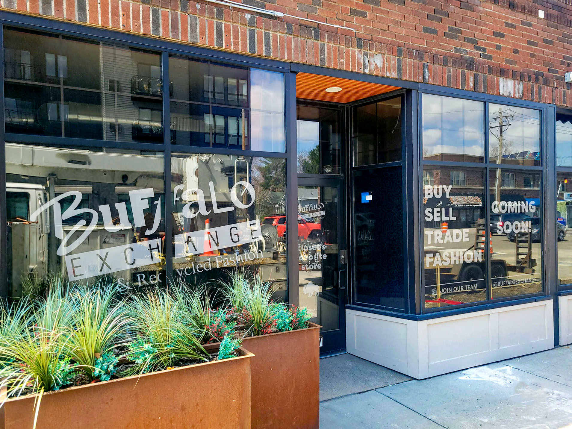 St Paul location exterior featuring planters and window decals