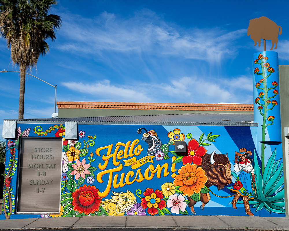 Vintage photo of Kerstin Block standing out front of the original Buffalo Exchange store