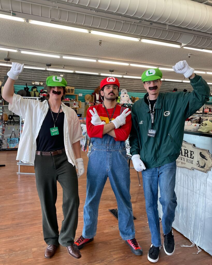 One person dressed up as Mario for Halloween, two as Luigi